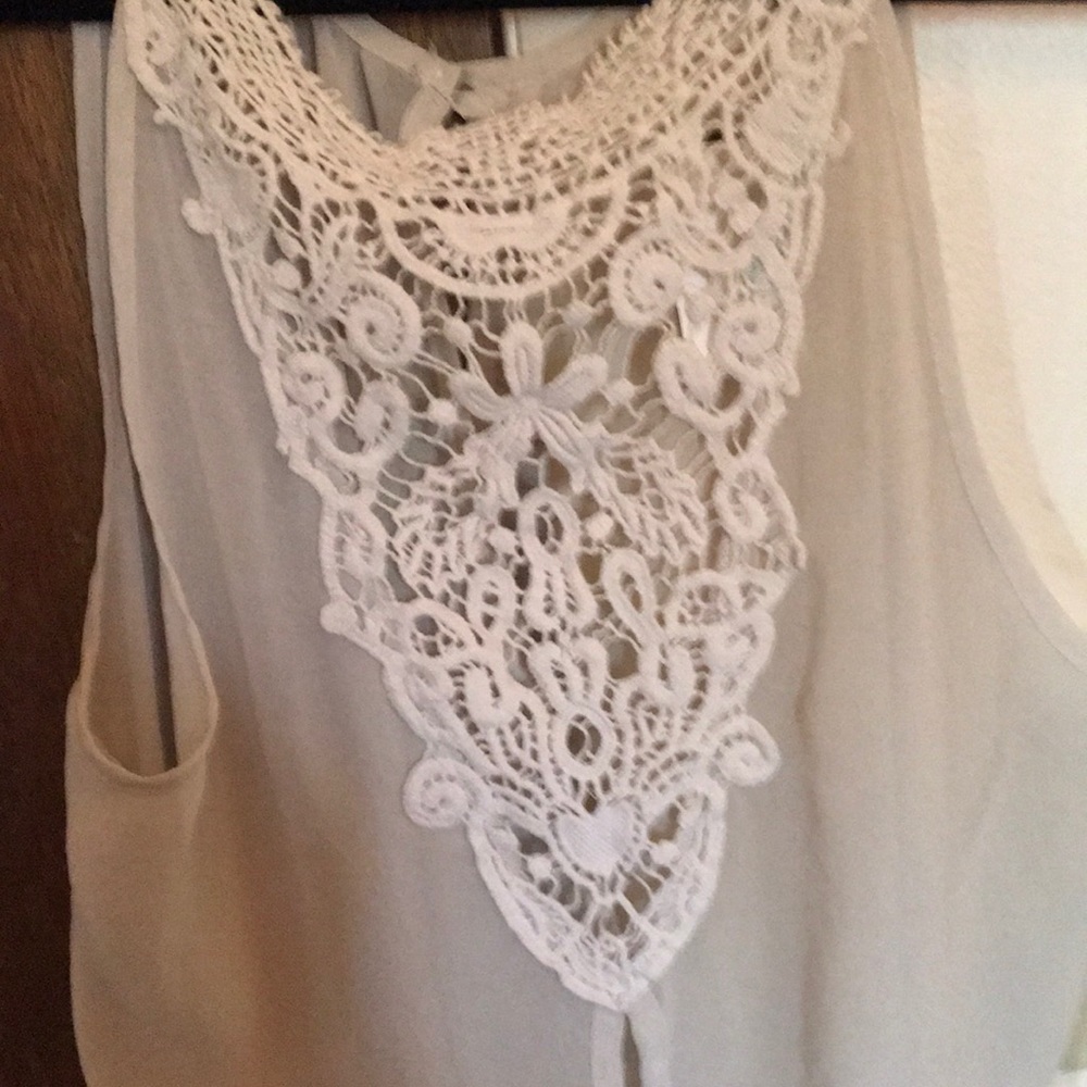 Ivory sleeveless draped top